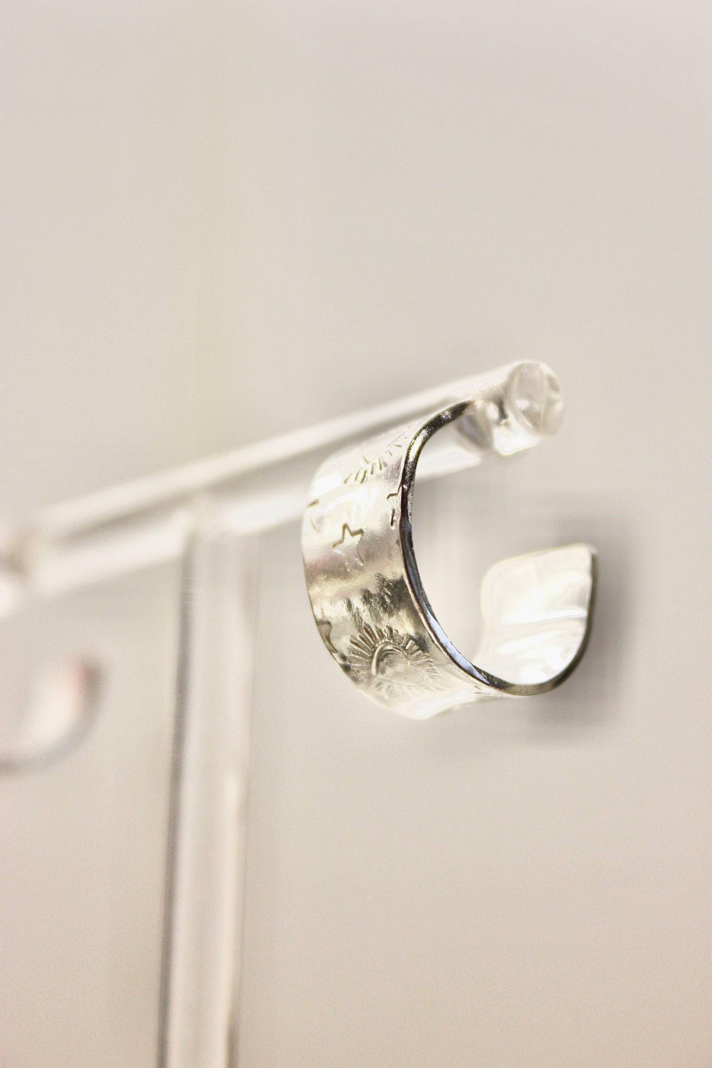 Chunky sacred heart and star hoop studs